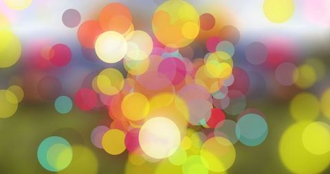 Vibrant Multicolored Bokeh Circles in Open Field