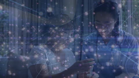 Asian Female Doctor with Patient Over Data and Light Effects