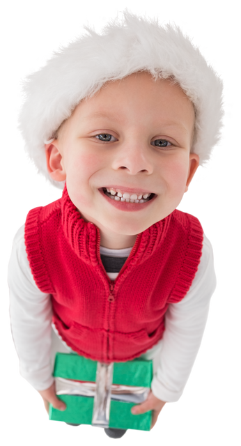 Smiling Child Holding Christmas Gift with Festive Hat Transparent Background - Download Free Stock Videos Pikwizard.com