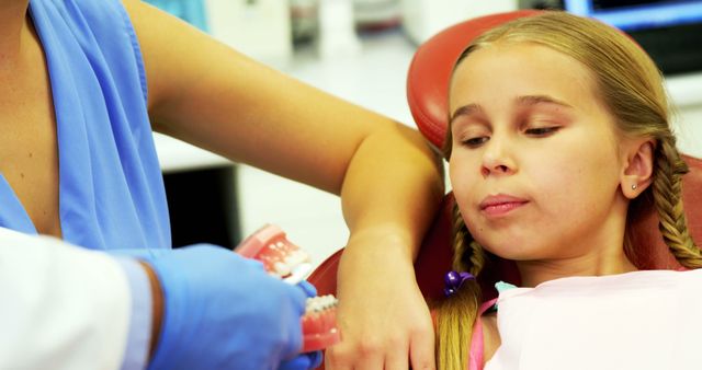 Child In Dentist Chair Learning About Oral Hygiene - Download Free Stock Images Pikwizard.com