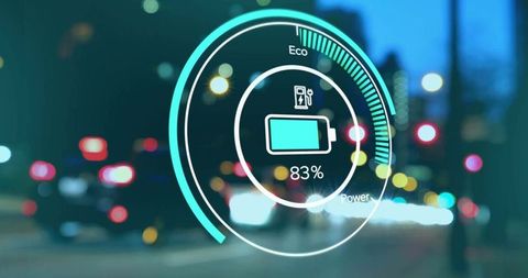 Electric Car Battery Charging Over Busy City Lights