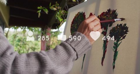 Artist painting under pergola with social media engagement overlay