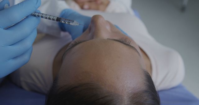 Close-up of Cosmetic Procedure on Young Woman's Forehead - Download Free Stock Images Pikwizard.com