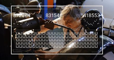 Mechanic diagnosing motorcycle with augmented reality diagnostics and numeric overlays