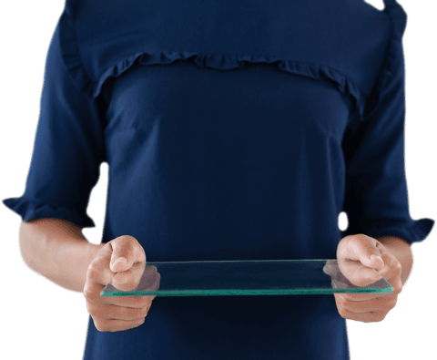 Businesswoman holding transparent glass interface