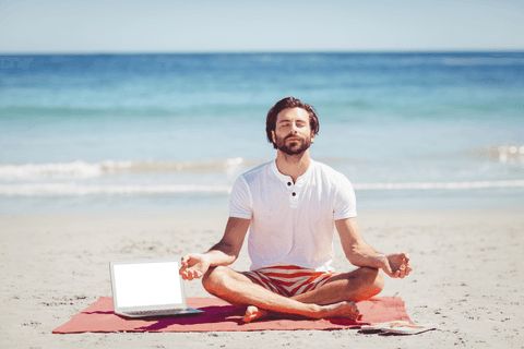 man meditating with laptop on transparent beach in sunshine - Download Free Stock Videos Pikwizard.com