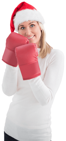 Festive woman wearing santa hat and boxing gloves on transparent background