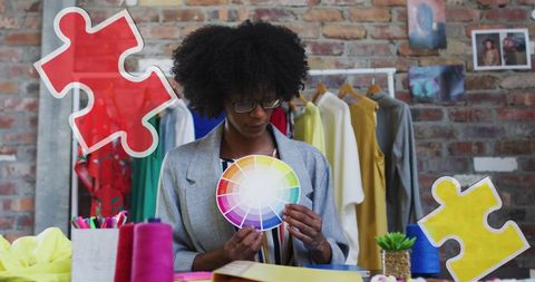 Creative fashion designer exploring color palette inspiration