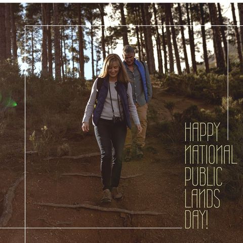 couple hiking in forest celebrating national public lands day - Download Free Stock Templates Pikwizard.com