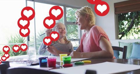 Mother and Daughter Bonding Over Creative Crafts