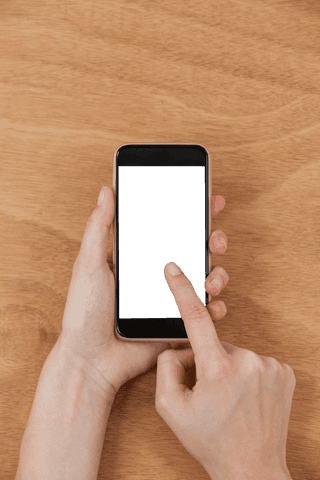 Transparent Smartphone Interaction on Wooden Surface - Download Free Stock Videos Pikwizard.com