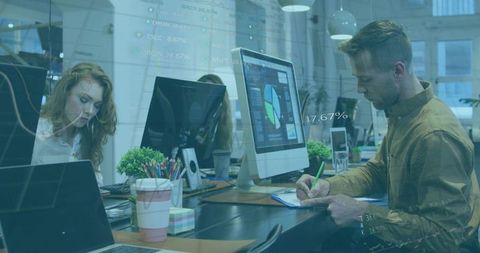 Modern Office Team Analyzing Data and Collaborating