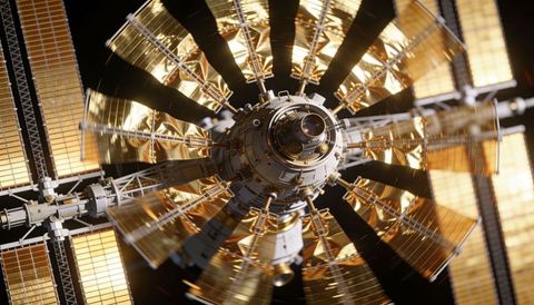 Rotating orbital hub revealing central research module with radial gold solar arrays