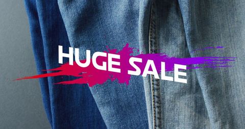 Huge Sale Banner on Denim Jeans Background