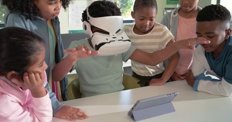 African American Children Exploring Virtual Reality Together in Classroom Using Tablet
