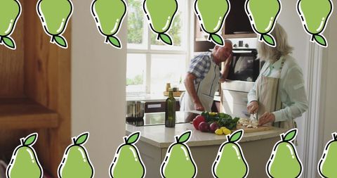 Happy Senior Couple Cooking Together in Kitchen