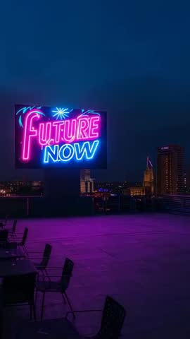 FUTURE NOW Neon Sign Lighting Rooftop Nightlife with Magenta Cyan Glow Vertical Video
