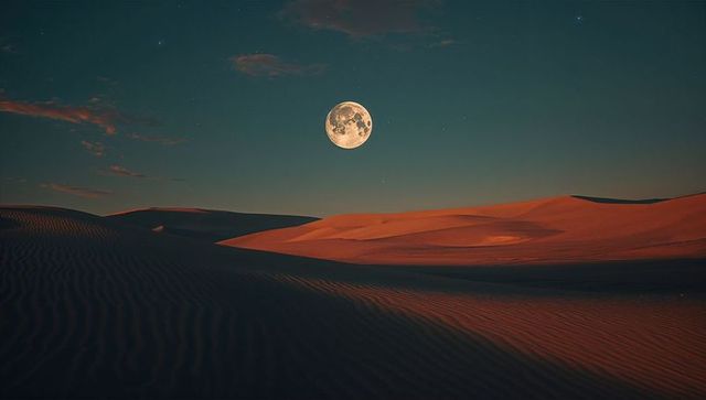 Glowing full moon over remote desert sand dunes at night