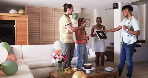 Friends Celebrate New Job Achievement with Champagne and Cake