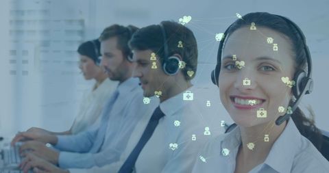 Customer Service Team with Headsets in Modern Call Center