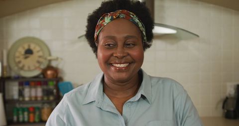 Senior Woman Smiling in Kitchen During Quarantine