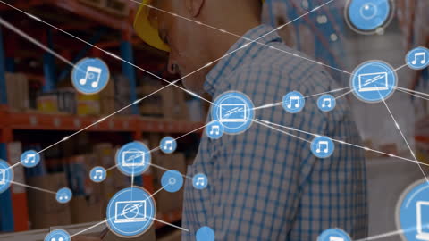 Supervisor Analyzing Digital Network in Modern Warehouse