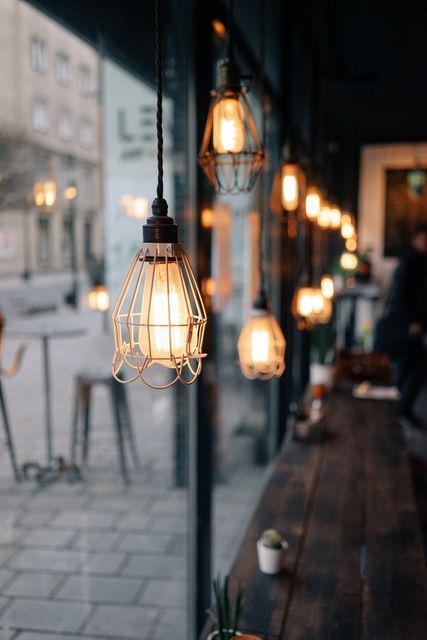 Vintage Industrial Hanging Lights in Modern Cafe Interior - Download Free Stock Images Pikwizard.com