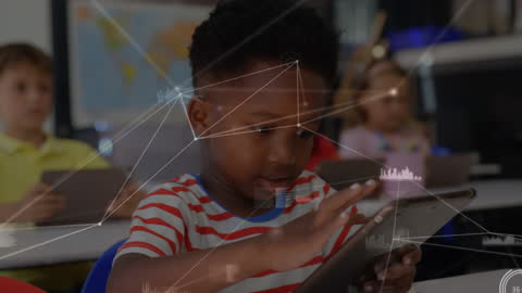 Young Student Using Tablet in Classroom with Digital Technology Overlay