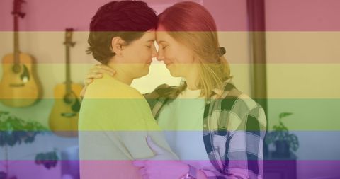 Romantic LGBTQ Couple Embracing with Rainbow Overlay
