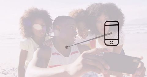 Family enjoying beach selfie on sunny day vacation