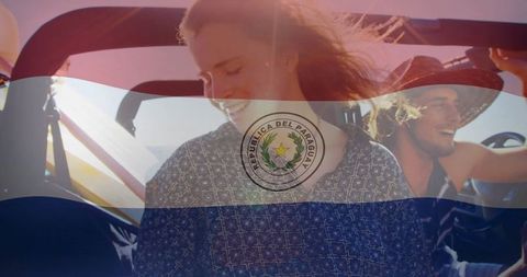 Joyful friends on road trip with paraguayan symbol