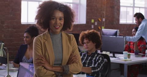 Confident Businesswoman Leading Diverse Creative Team in Modern Office - Download Free Stock Images Pikwizard.com