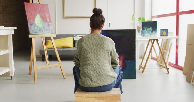 Artist Observing Her Canvas in a Studio - Download Free Stock Photos Pikwizard.com