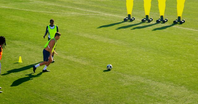 Young Men Focused on Soccer Skill Training in Sunny Field - Download Free Stock Images Pikwizard.com