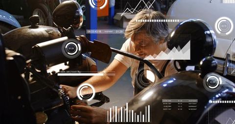 Mature mechanic repairing classic motorcycle with augmented reality diagnostics hud