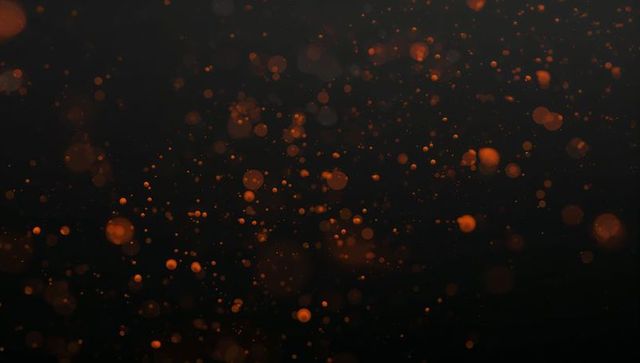 Luminous Orange Spheres in Dark Abstract Canvas