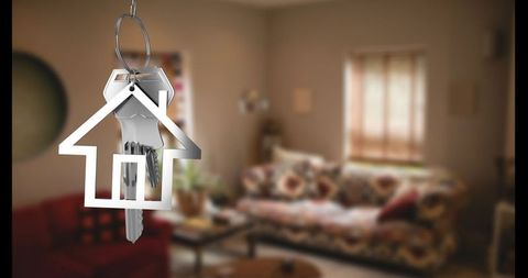 Keys with Home Keychain Hanging in Cozy Living Room