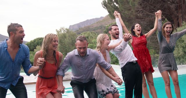 Group of Friends Celebrating in Pool Party with Hands Raised - Download Free Stock Images Pikwizard.com