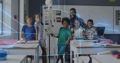 Teacher guiding students exploring human skeleton with augmented reality and digital overlay