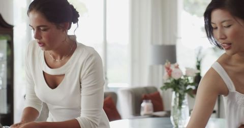 Wedding Preparations with Two Women in Elegant Interior Setting