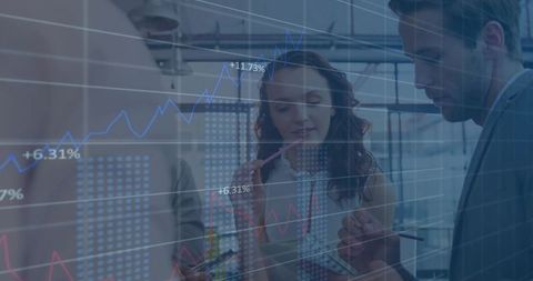 Business Team Analyzing Financial Data with Technology and Charts