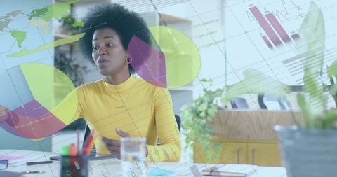 Businesswoman Analyzing Financial Data in Modern Office