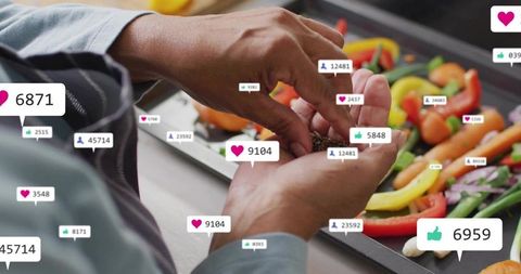 Senior cook sprinkling seeds on roasted vegetables with social media likes overlay