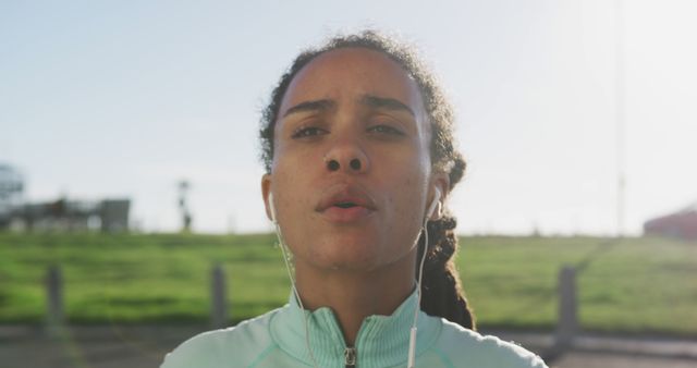 Determined Young Woman Jogging Outdoors in Early Morning Light - Download Free Stock Images Pikwizard.com