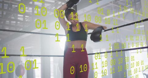 Boxer in ring with digital binary code overlay