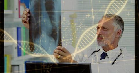 Male doctor examining chest x-ray with dna helix overlay representing genomic diagnostics