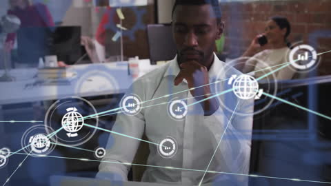 Businessman Analyzing Network Connections in Modern Office