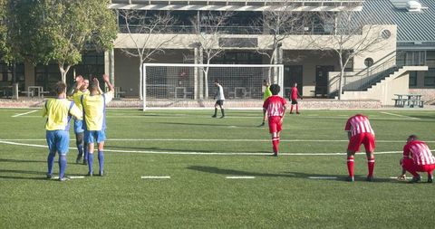 Soccer players during penalty kick on field