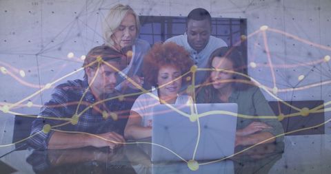 Diverse team collaborating on laptop with dynamic data overlay, network visualization