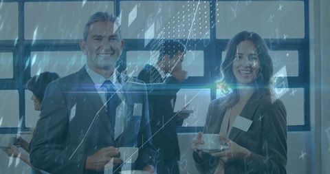 Business professionals networking with technology at conference event